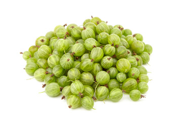 Fresh green gooseberries piled together on a clean white background, showcasing their round shape...