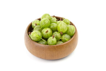 Fresh green gooseberries arranged in a wooden bowl, showcasing their vibrant color and natural texture, perfect for culinary uses or healthy snacking options