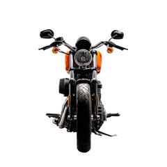 Front view of an orange motorcycle.  Dark background