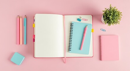 Pastel Pink Workspace Flat Lay with Open Notebook, Stationery and Potted Plant