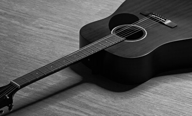 acoustic guitar on black background