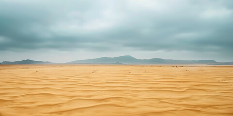 Fototapeta premium Desert dunes beneath dramatic storm clouds in moody sky 