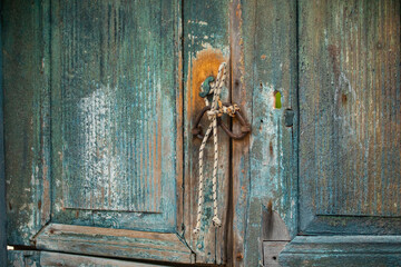 Rustic Wooden Door Rope Metal Lock Weathered Panels Close-up