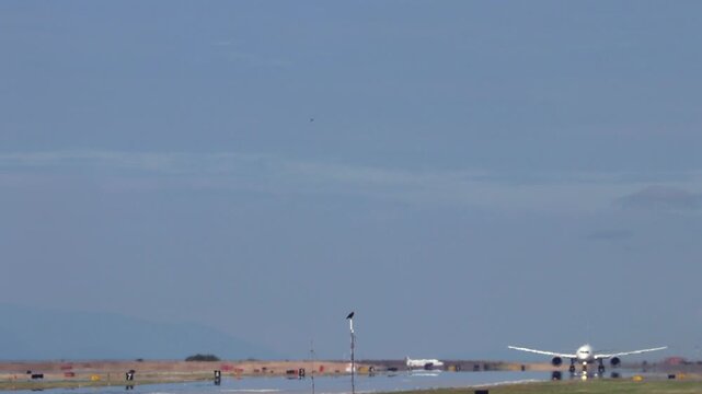 Commercial aircraft airplane taking off from airport