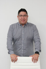 30-year-old Latino man with glasses is proud to be a successful business entrepreneur