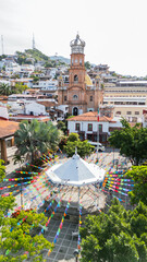 Colorful papel picado decorations in the main square of Puerto Vallarta, Independence Day in Mexico
