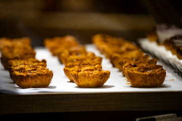 Classic Dessert: Neatly Arranged Portuguese Egg Tarts