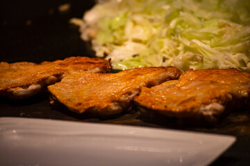  a delicious cooking scene on a hot griddle