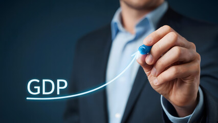 Man drawing GDP growth chart with upward arrow, symbolizing economic prosperity