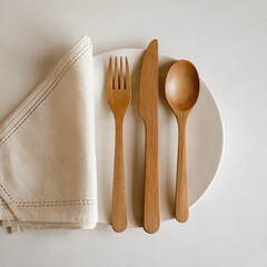 Wooden Cutlery Set and Napkin Mockup on White Background
