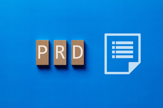 PRD wood block for Business. An abbreviation for Product Requirements Document, great for articles on project management and quality control.