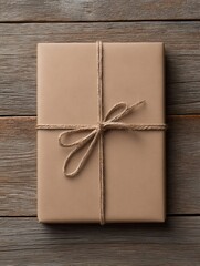 Gift Wrapped in Brown Paper and Twine Rests on Rustic Wooden Table