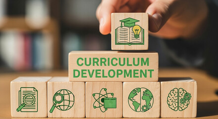 Wooden blocks stacked showing curriculum development with education and knowledge icons on each block