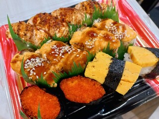 Japanese Sushi food with various interesting and delicious fillings and toppings