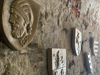 Gold metal emblem of different Slovakian royalty in spiš castle