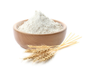 Wheat flour in bowl and spikelets on white background