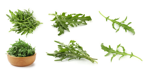 Fresh green arugula on white background, set
