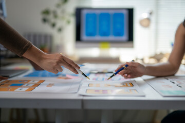 Two people are working on a project together