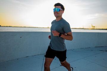 Enjoying a jog by the waterfront during twilight hours