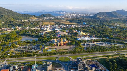Aerial view of Beto Carrero World theme park with distant view of Itajaí and Balneário Camboriú.