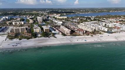 amazing warm Gulf of Mexico waves gently lap on the sugar sand beaches of Siesta Key Island, Florida