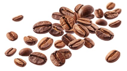 Scattered roasted coffee beans on a plain white background close up