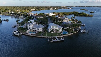 fingers of developed land holding luxury properties on the coast of South Sarasota, island vibes,...