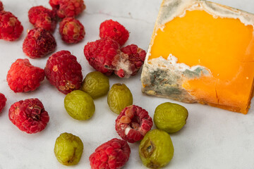 Molded cheese grapes and raspberries