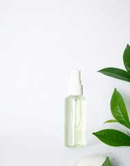 Refreshing natural serum bottle with green leaves, perfect for skincare and wellness promotions