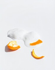 Refreshing citrus foam with bright orange peels, creating a clean, natural, and invigorating sensory experience