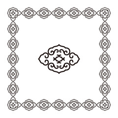 An abstract black cloud pattern forms a symmetrical traditional elegant decorative frame.