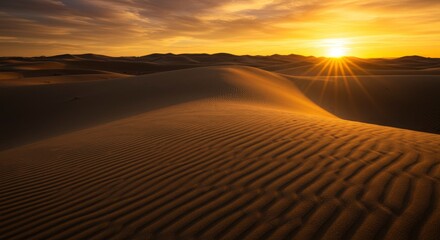 Desert dunes at sunset