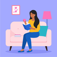 Illustration of a woman reading a book while holding a menstrual cup, sitting on a pink couch with a lamp, a picture with hearts, and another book in a cozy room.