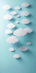 Delicate paper art stylized clouds on soft blue background
