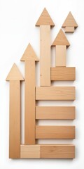 Wooden chart with upward-pointing arrows and a progress trend