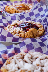 Close-Up of Freshly Made Fairground Funnel Cake with Powdered Sugar