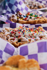 Close-Up of Freshly Made Fairground Funnel Cake with Powdered Sugar