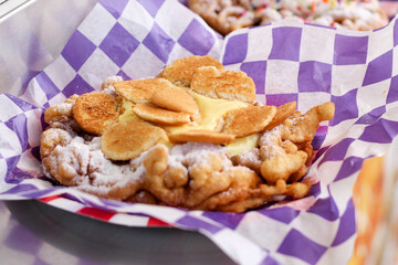 Close-Up of Freshly Made Fairground Funnel Cake with Powdered Sugar