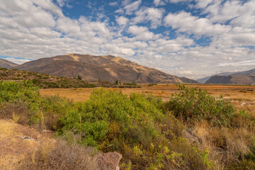 a beautiful view of the Peruvian mountains with the dramatic skies of Peru
