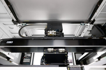 Advanced pick-and-place machine for precise PCB component assembly in a modern manufacturing...