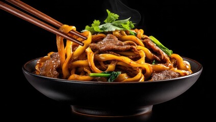 Steaming noodles and beef in a dark bowl, lifted with chopsticks against a black background