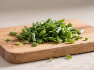 Close-up of fresh chives chopped on wooden cutting board,  aromatic,  texture