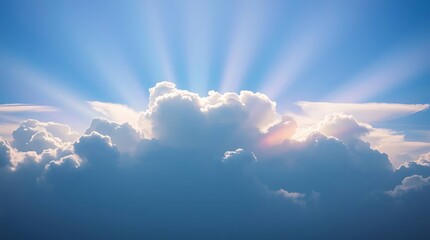 Blue sky background with tiny clouds and sunbeams.