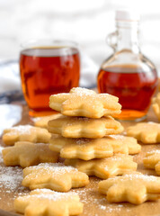 Delicious Maple Leaf Cookies with Powdered Sugar and Syrup