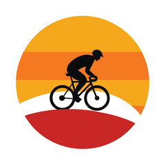 silhouette of a man riding a bike
