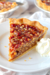 Delicious Texas Pecan Pie Slice with Whipped Cream