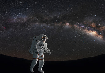 Astronaut in space milky way galaxy