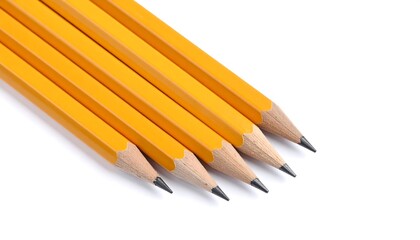 Sharpened Yellow Pencils Aligned on White Background for Education and Creativity