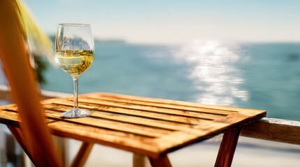 White Wine at the Seaside Sunny Beach with Wooden Table