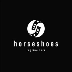 Horseshoe logo concept, illustration of a vintage retro symbol, a simple, modern Texas horseshoe concept and as a symbol of a product brand or template illustration.